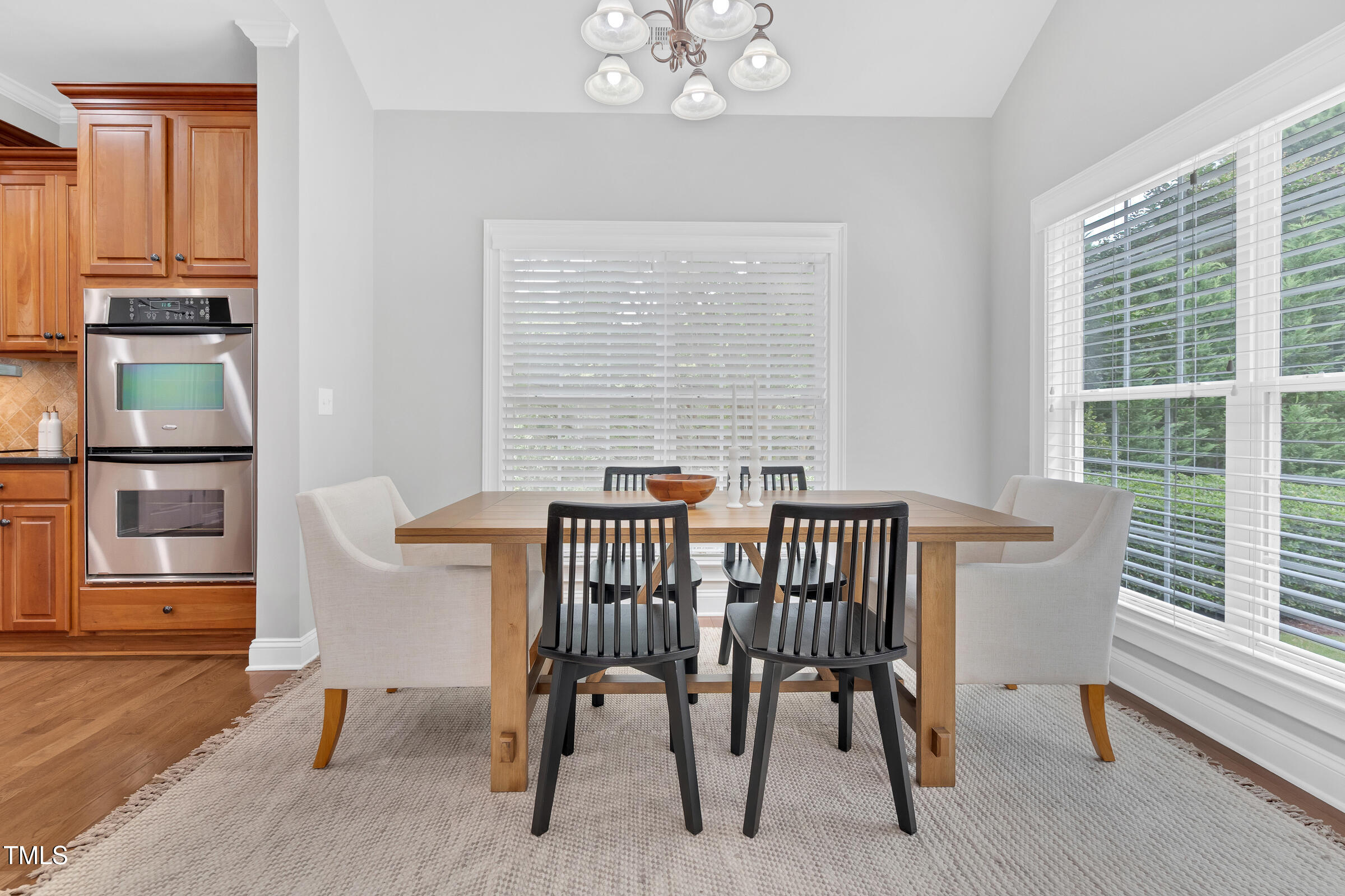 216 Creststone Drive Cary, NC 27519 - Photo 10 of 19 a view of a dining room with furniture window and outside view