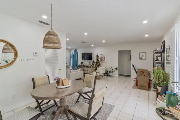 a view of a dining room with furniture