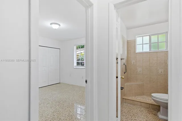 an empty room with windows