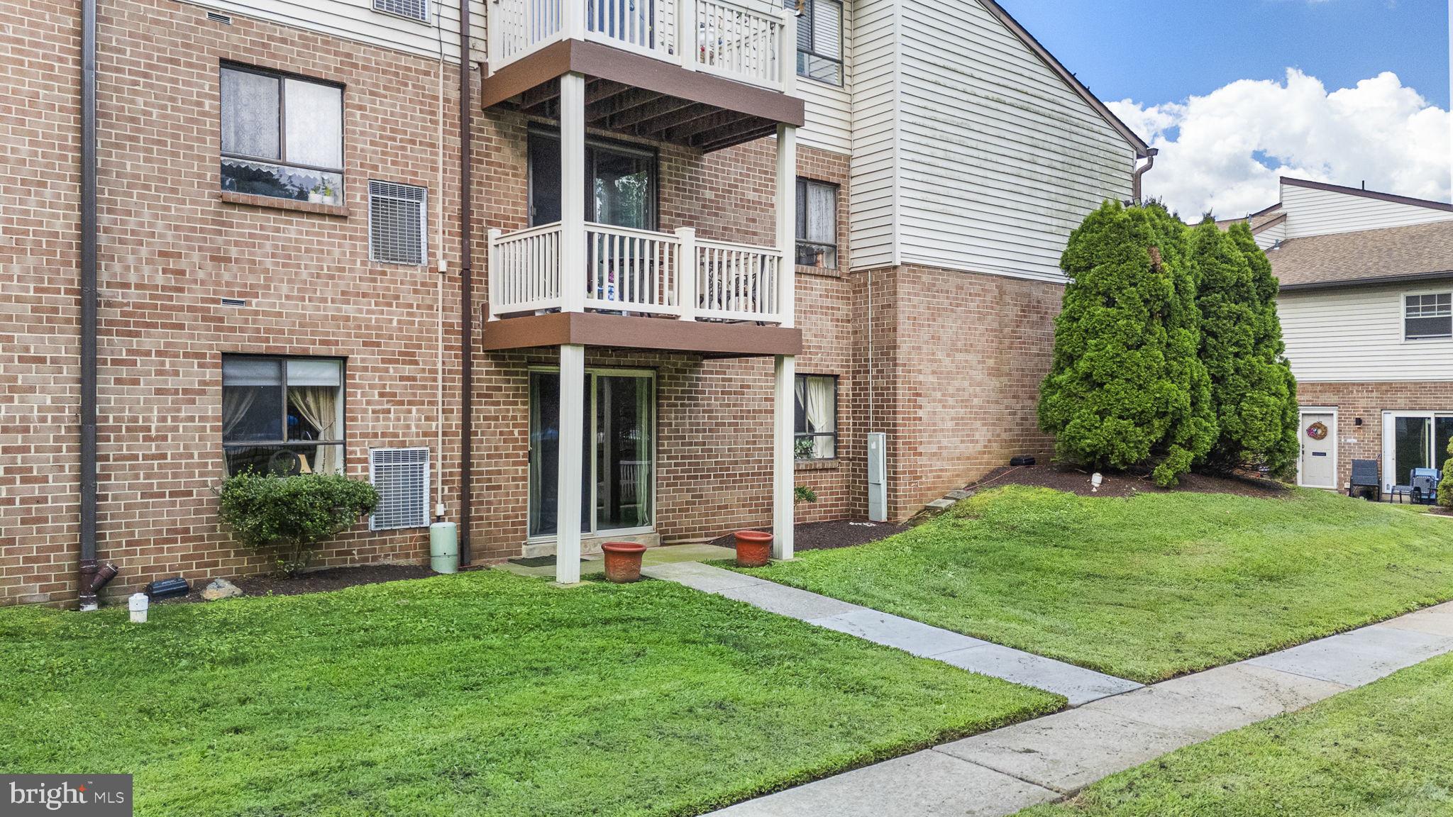 280 Bridgewater Road Brookhaven, PA 19015 - Photo 18 of 20 Charming brick facade with lush greenery.