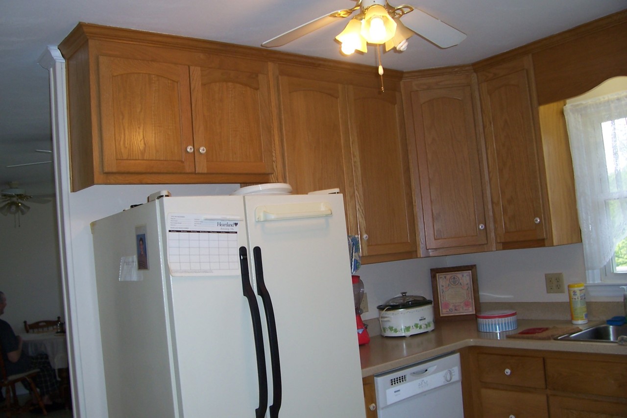 2470 Highland Road Roanoke, VA 24014 - Photo 11 of 12 a kitchen with a refrigerator and cabinets
