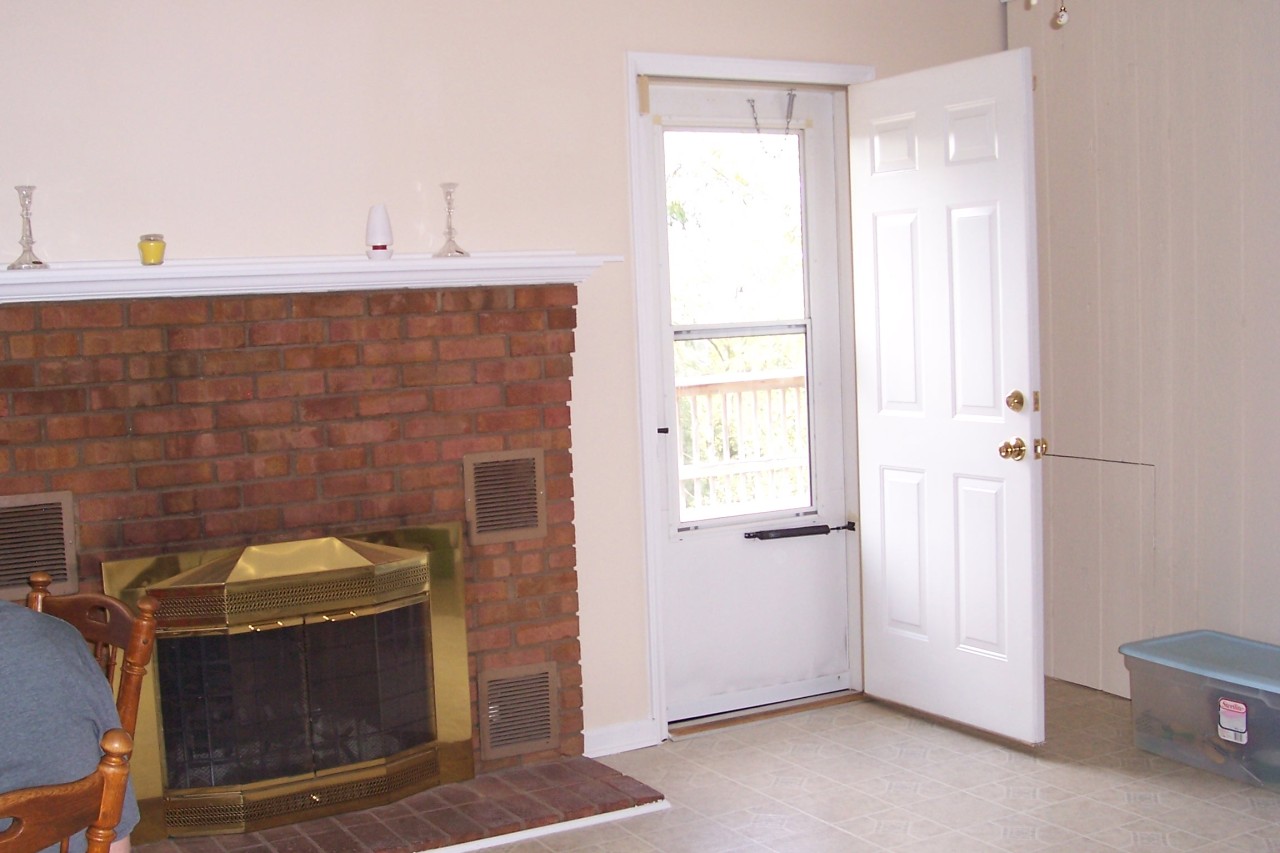 2470 Highland Road Roanoke, VA 24014 - Photo 6 of 12 a view of an empty room with a fireplace