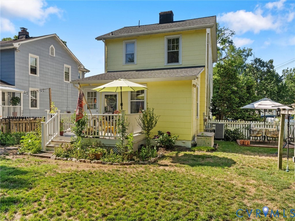 1812 Seddon Road Richmond, VA 23227 - Photo 46 of 56 Rear exterior featuring a light yellow siding, whi