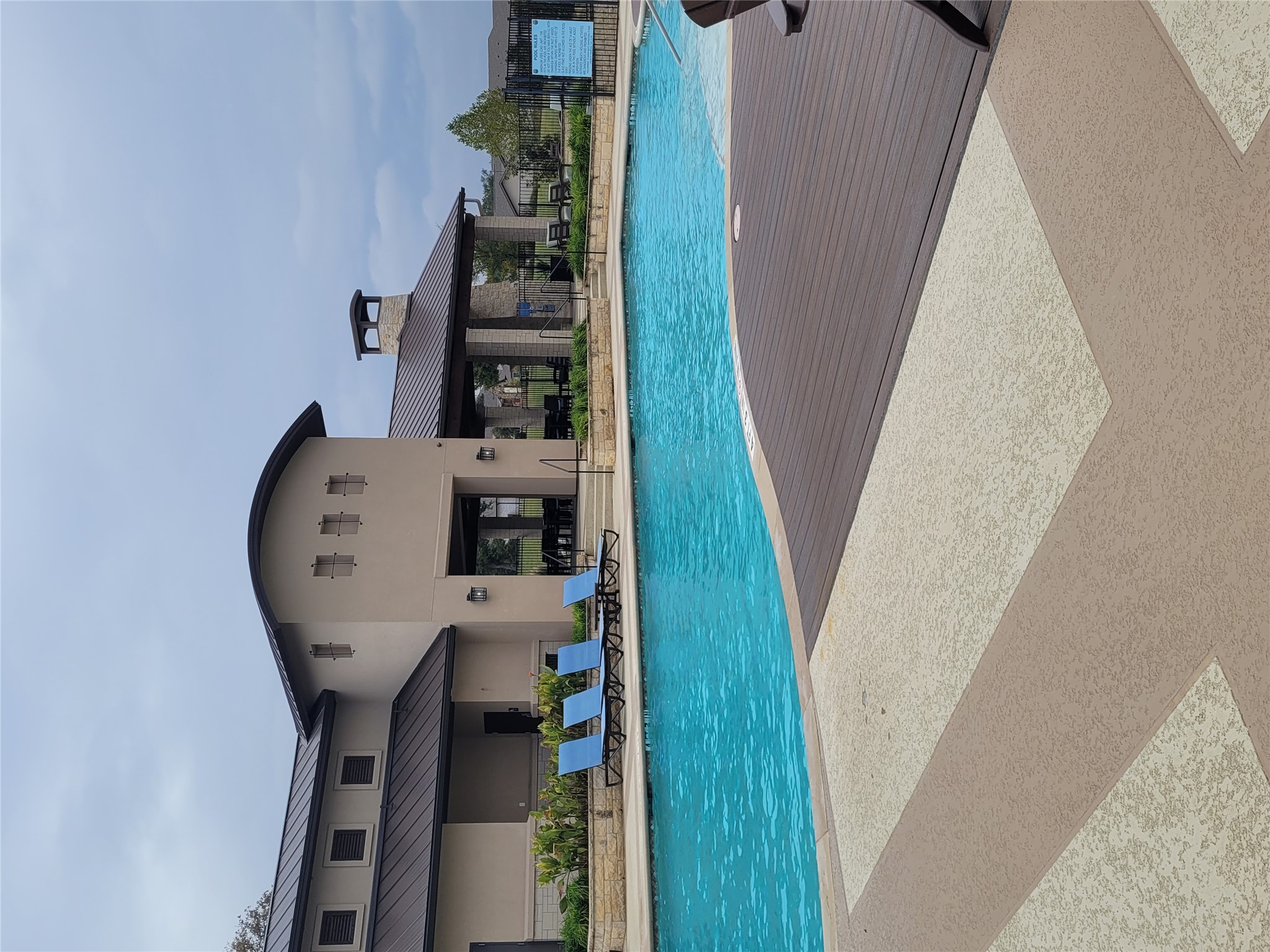 120 Free Stone Drive Georgetown, TX 78628 - Photo 34 of 40 A refreshing pool awaits, perfectly complemented by a well-appointed clubhouse.