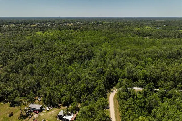 a view of a yard with an outdoor space