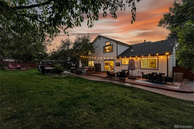 a view of a park with bench and trees