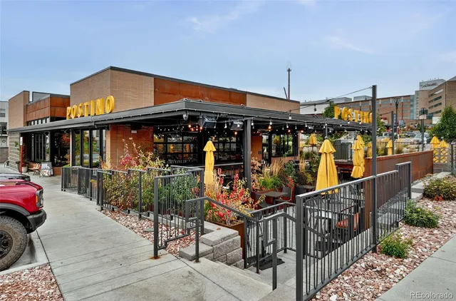 a view of a chairs and tables in patio