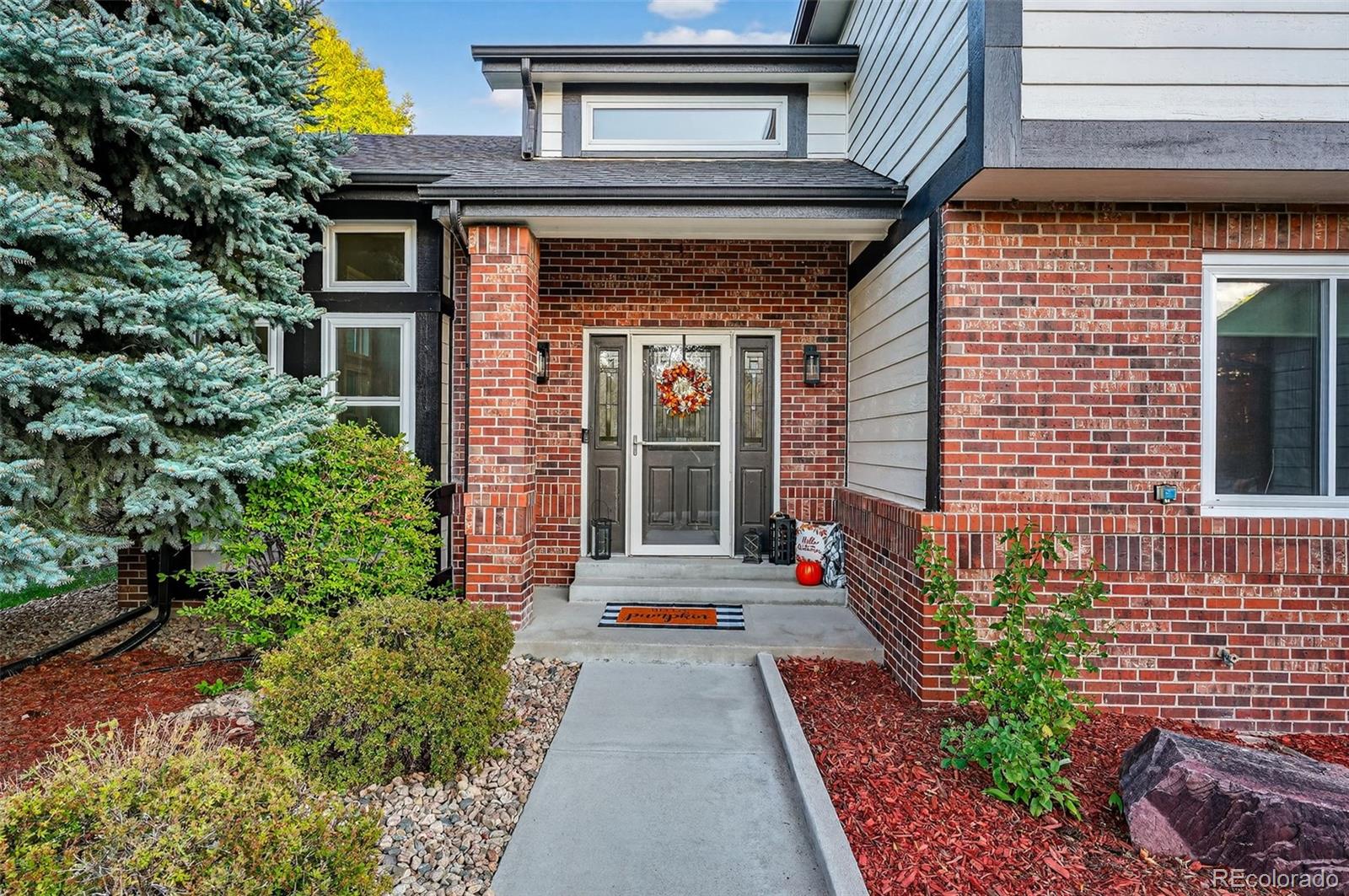 9910 Ashleigh Way Highlands Ranch, CO 80126 - Photo 8 of 49 a view of entrance of the house