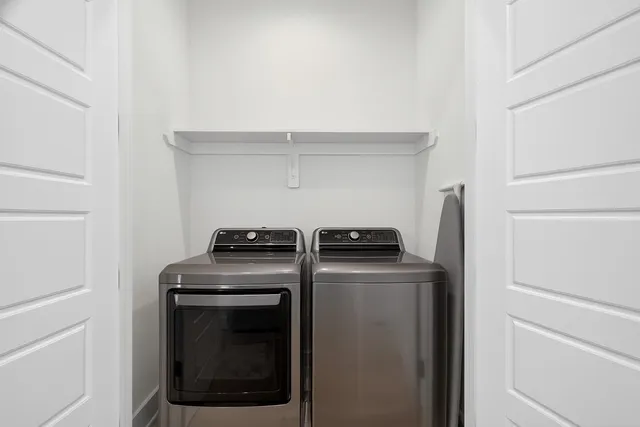 a kitchen with a stove and a refrigerator