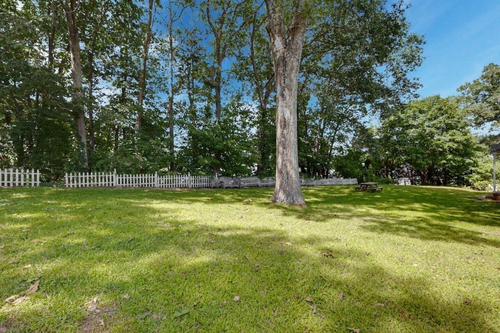 22 Southwest Cutoff, Unit D Northborough, MA 01532 - Photo 10 of 12 a view of a yard with a tree