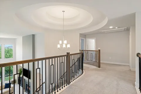 a bedroom with a bed lamp closet and large window