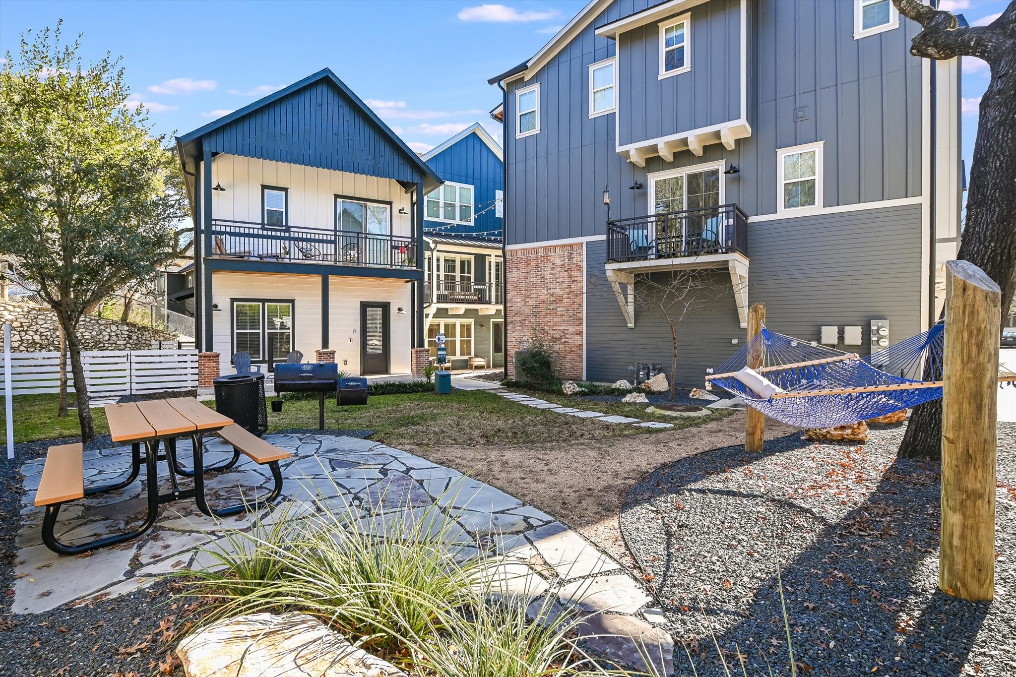 3809 Valley View Road, Unit 7 Austin, TX 78704 - Photo 20 of 21 Back of house featuring a balcony and a patio