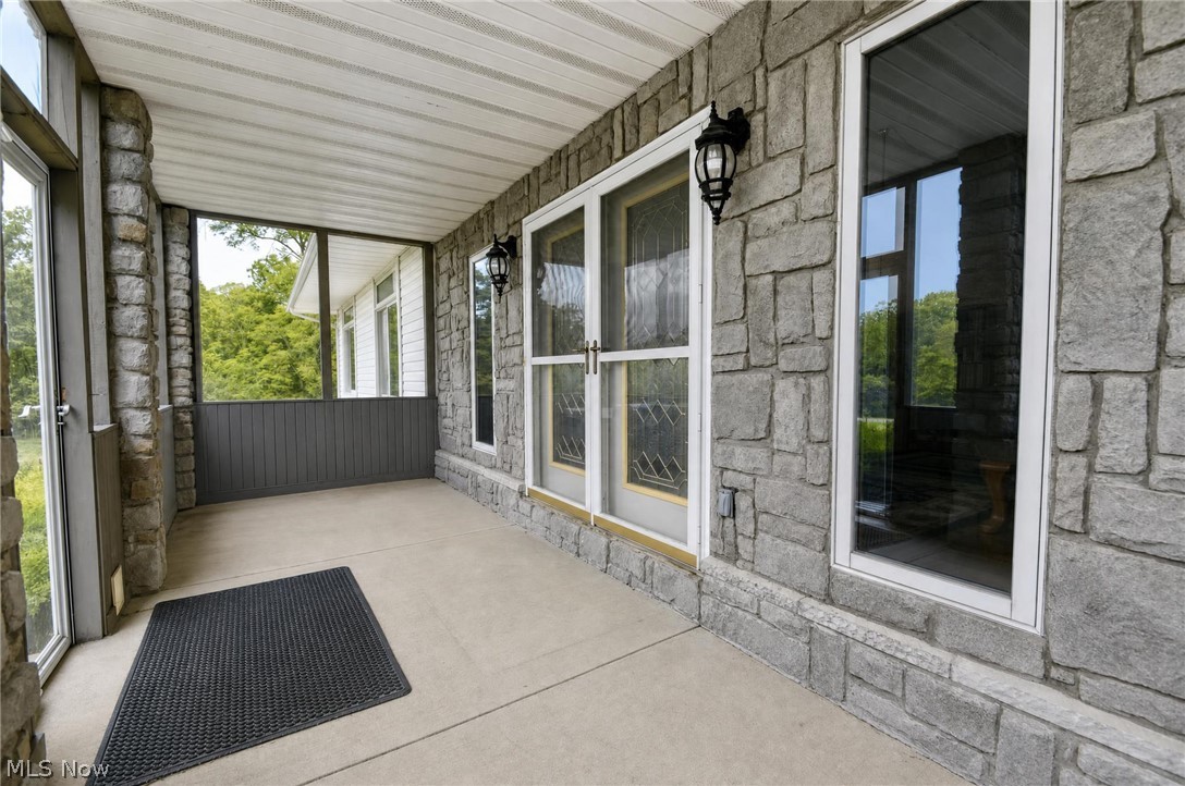 11226 Sperry Road Chesterland, OH 44026 - Photo 6 of 38 Enclosed front porch