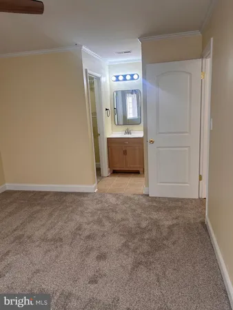 a bathroom with a toilet and a bathtub