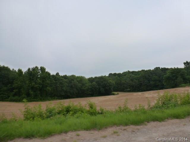 978 John Doster Road Pageland, SC 29728 - Photo 7 of 7 a view of a lake with a yard
