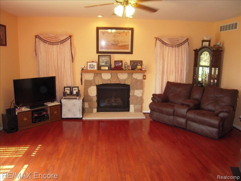 5036 Granger Road Oxford, MI 48371 - Photo 10 of 25 Family Room w/Cozy Fireplace