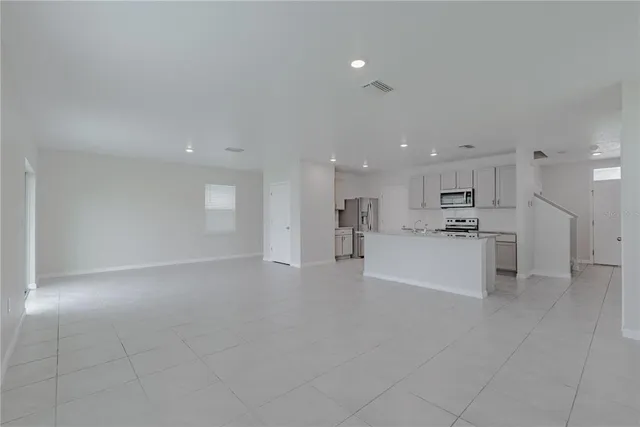 a view of an empty room with window