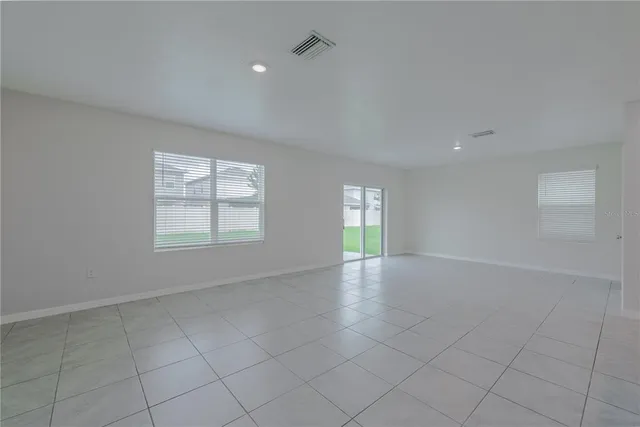 a white toilet sitting next to a white sink