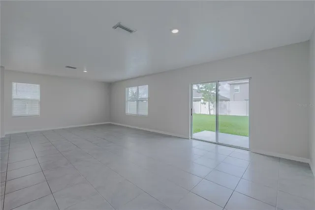 a kitchen with a sink stove and refrigerator