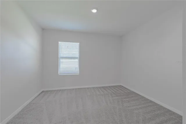 a view of cabinets and wooden floor