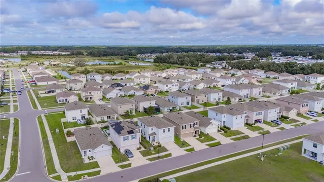 an aerial view of multiple house