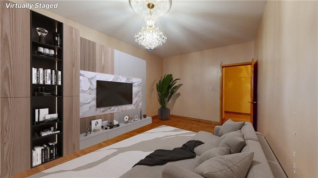 a bedroom with furniture and a flat screen tv