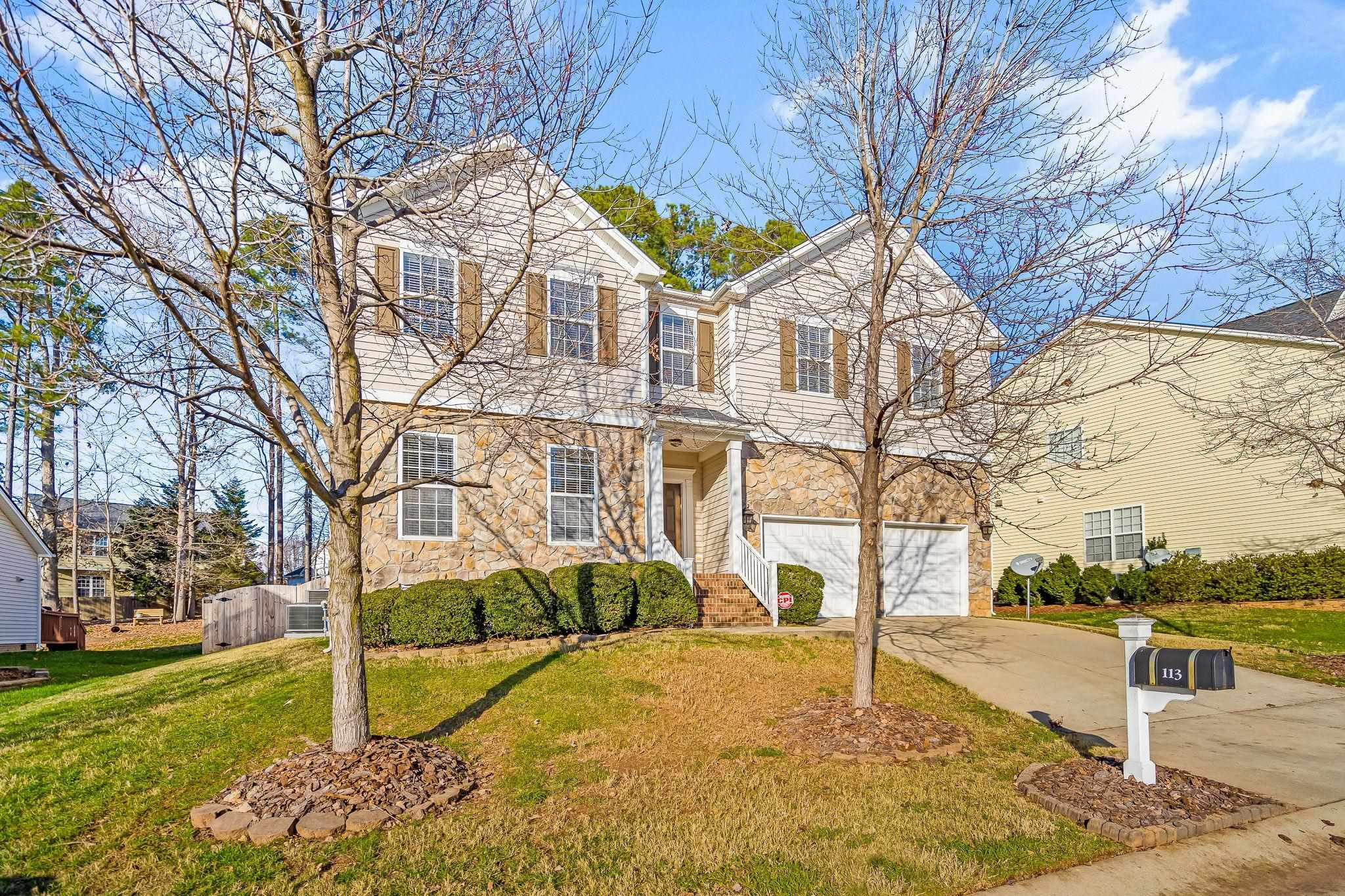 113 Whitney Lane Durham, NC 27713 - Photo 2 of 34 a street view with large trees