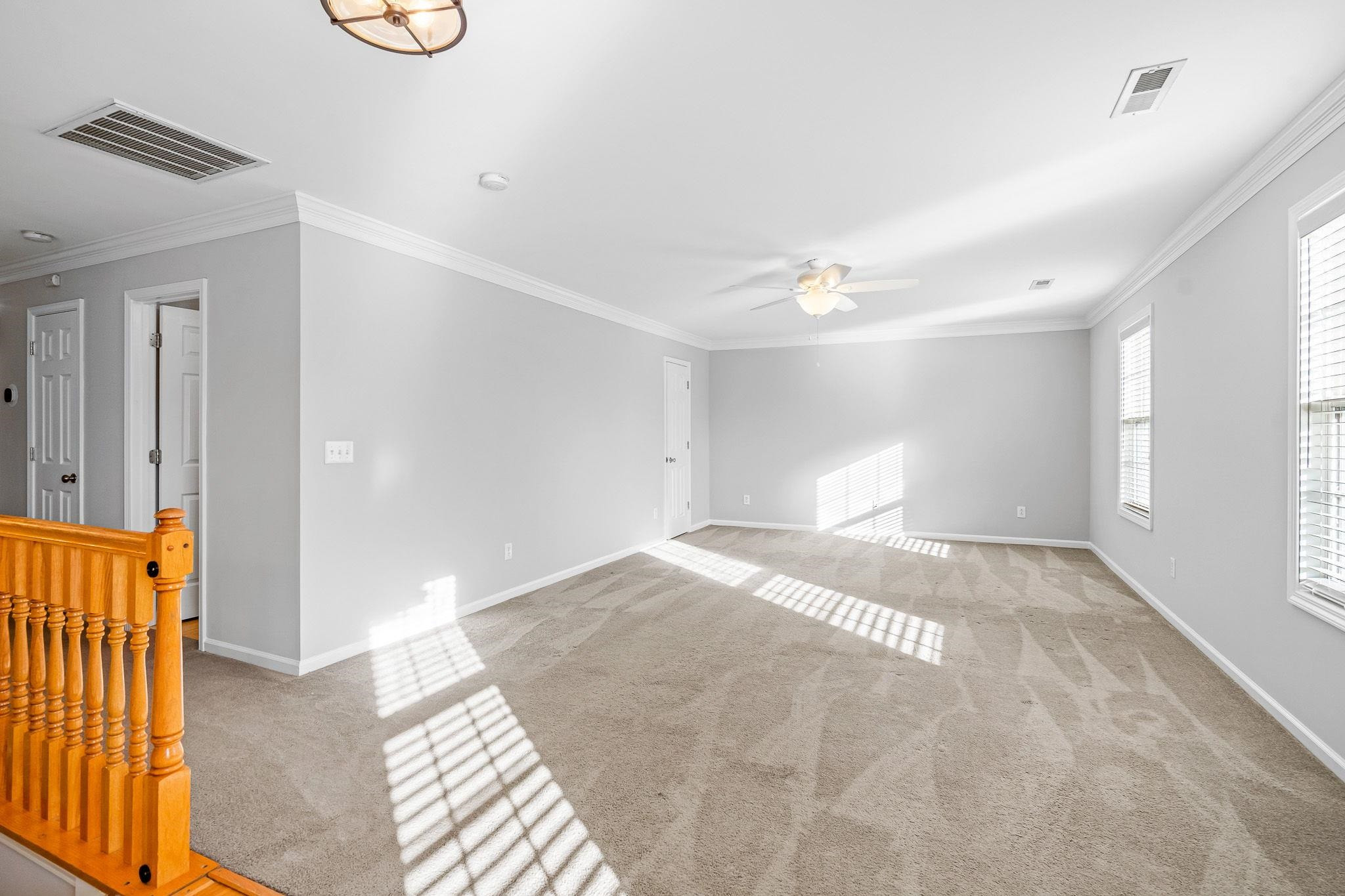 113 Whitney Lane Durham, NC 27713 - Photo 23 of 34 a view of an empty room