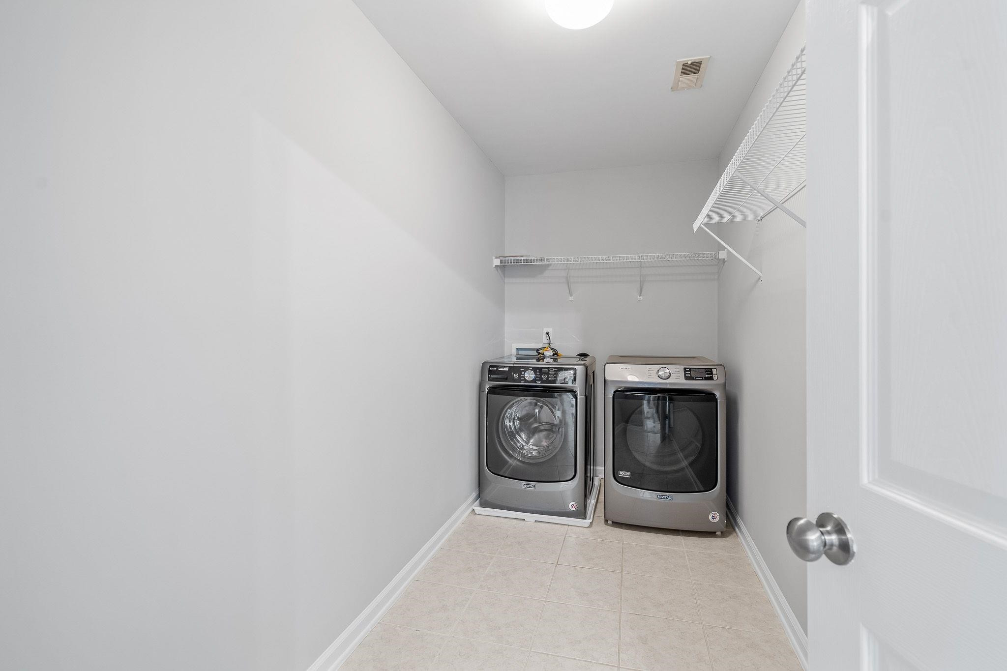 113 Whitney Lane Durham, NC 27713 - Photo 30 of 34 a utility room with dryer and washer