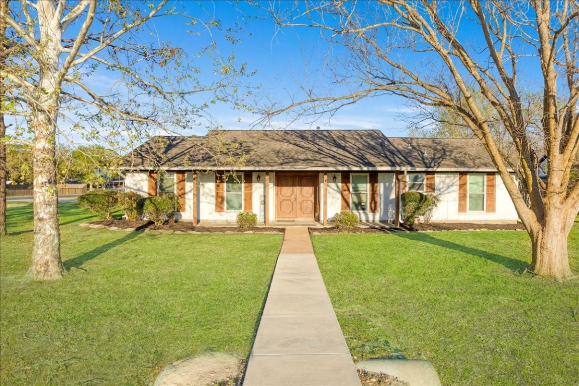 3809 Wingtail Way Pearland, TX 77584 - Photo 1 of 29 a view of a yard in front of house