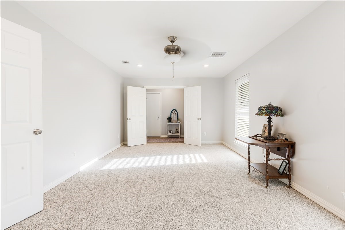 3809 Wingtail Way Pearland, TX 77584 - Photo 6 of 29 a view of a livingroom with a staircase