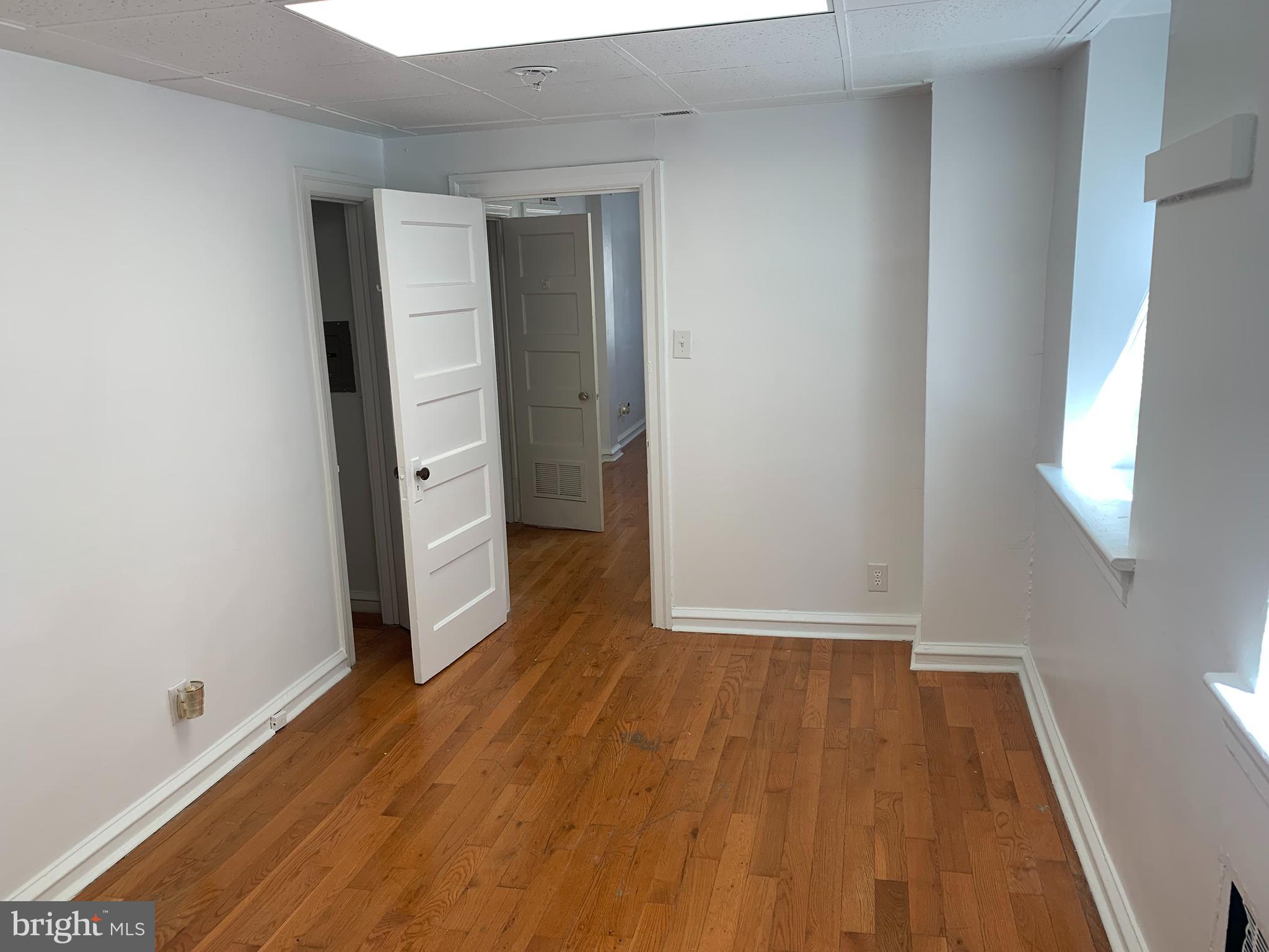 8 Overhill Road, Unit A Upper Darby, PA 19082 - Photo 3 of 6 wooden floor in an empty room