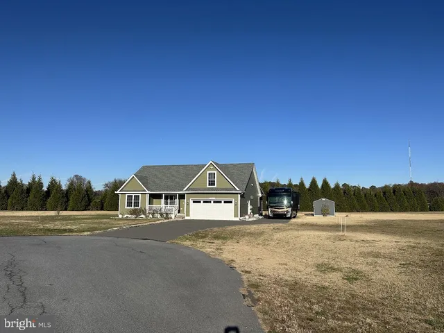 a view of swimming pool with an outdoor space and seating area