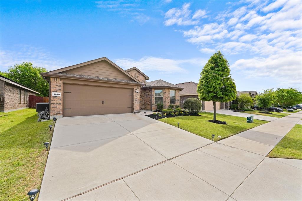 9020 Ridgeriver Way Fort Worth, TX 76131 - Photo 3 of 26 a view of outdoor space yard and garage