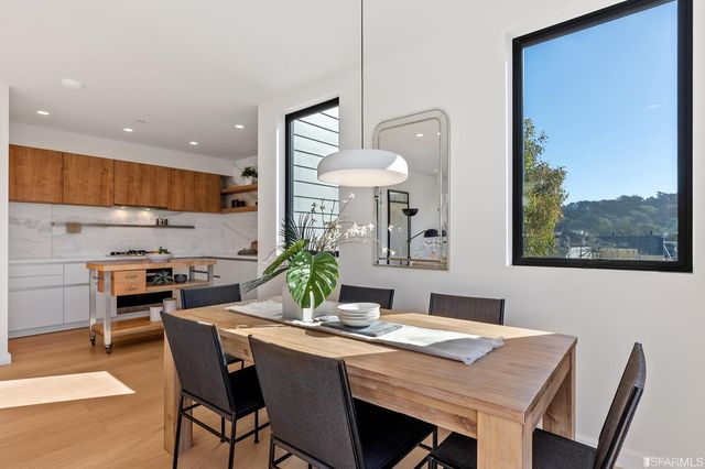 a view of a dining room with furniture