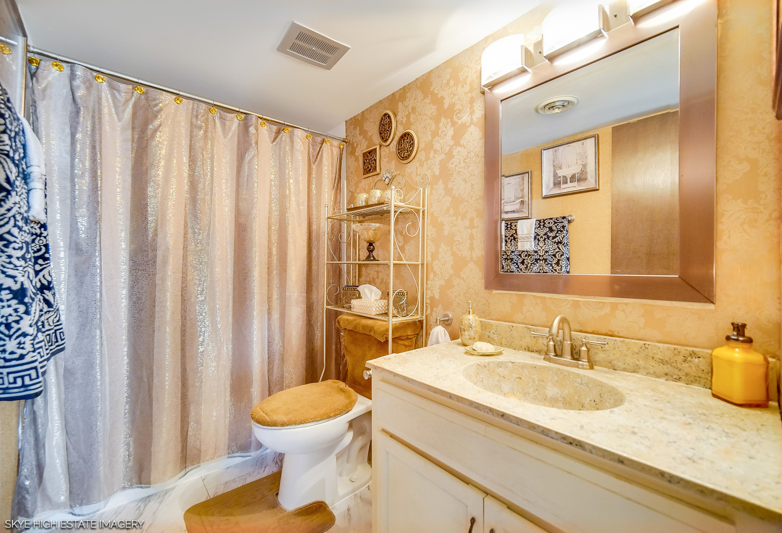 18855 Burnham Avenue, Unit 234 Lansing, IL 60438 - Photo 13 of 19 a bathroom with a granite countertop sink and a mirror