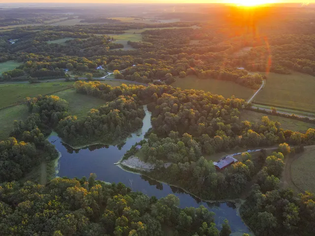 an aerial view of residential house and ocean