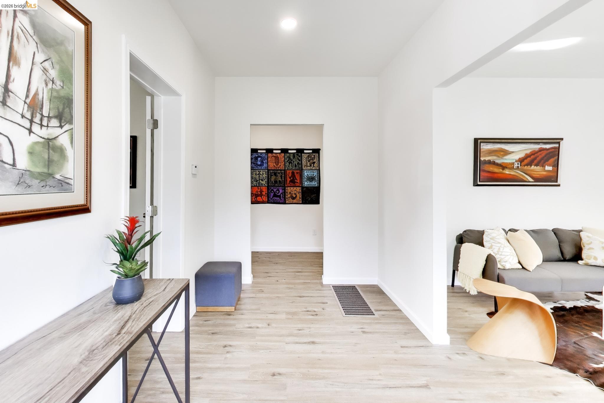 1978 Rosedale Avenue Oakland, CA 94601 - Photo 12 of 36 a living room with furniture and wooden floor