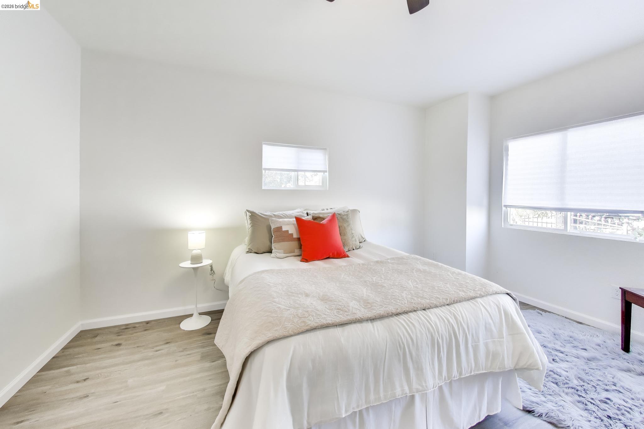 1978 Rosedale Avenue Oakland, CA 94601 - Photo 14 of 36 a bedroom with a bed and a window