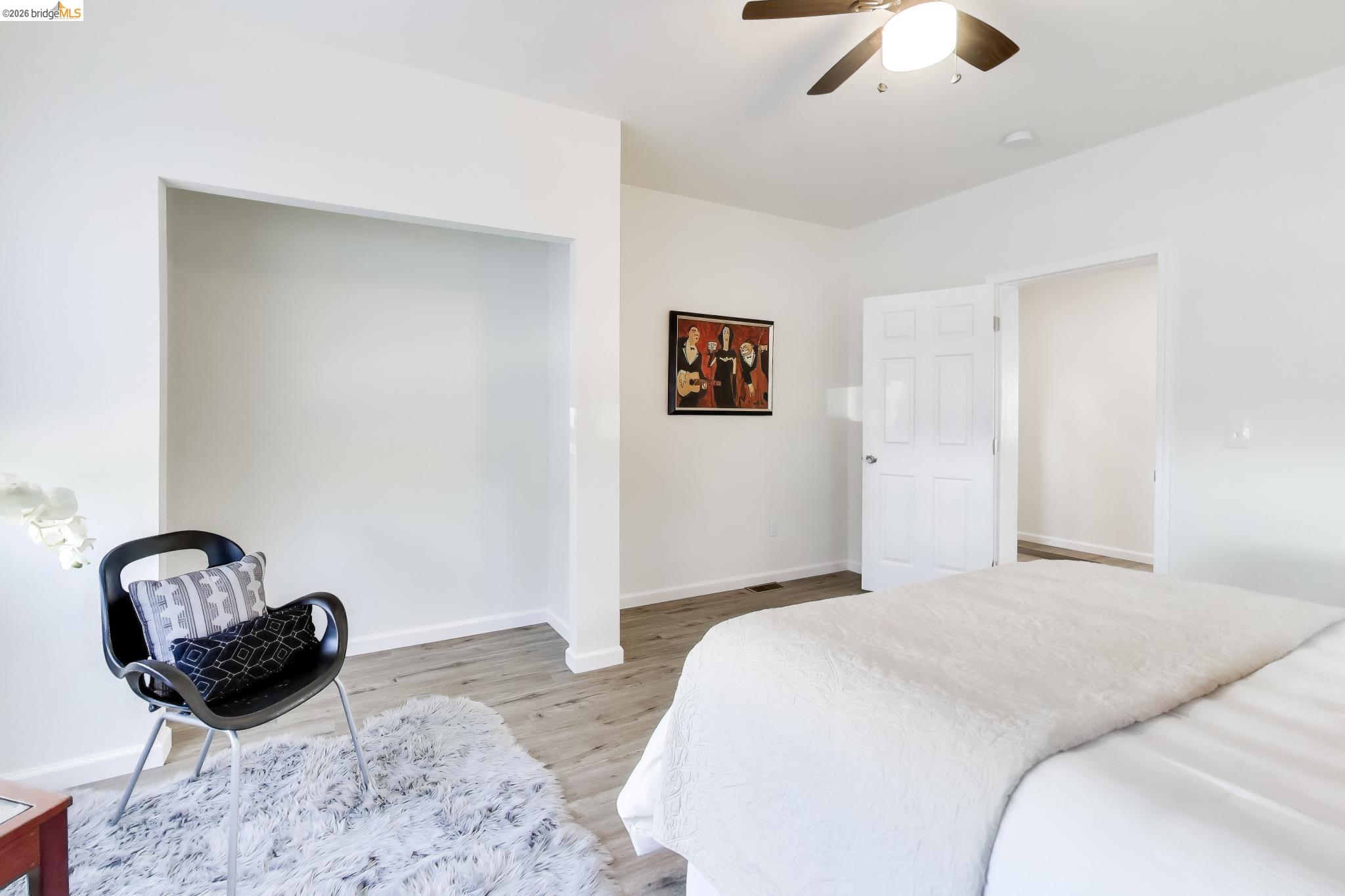 1978 Rosedale Avenue Oakland, CA 94601 - Photo 16 of 36 a bedroom with a bed and a dresser