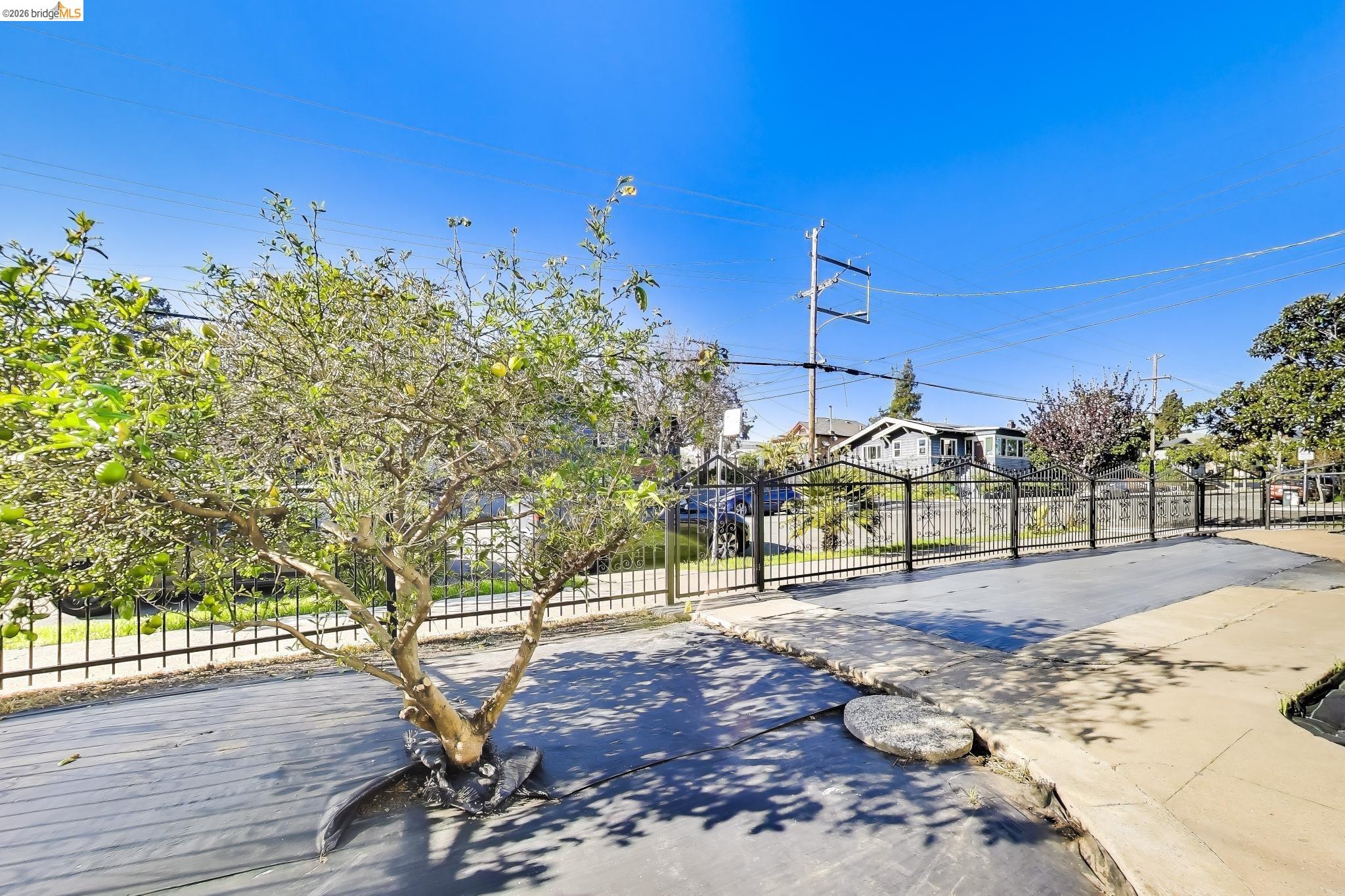 1978 Rosedale Avenue Oakland, CA 94601 - Photo 33 of 36 a view of a road with a building in the background
