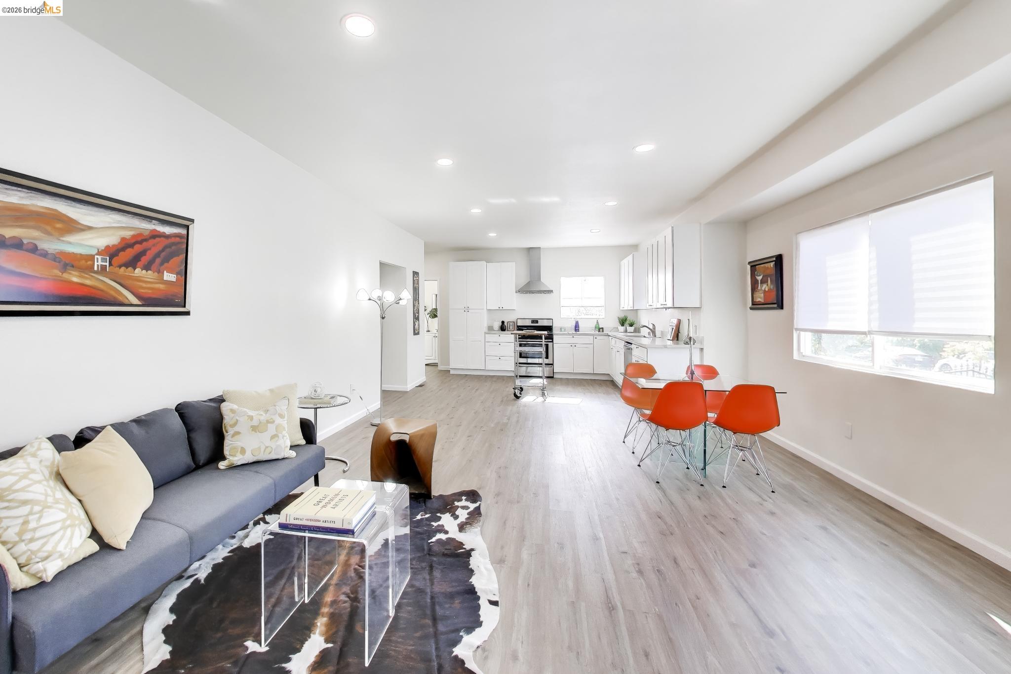 1978 Rosedale Avenue Oakland, CA 94601 - Photo 4 of 36 a living room with furniture and a wooden floor