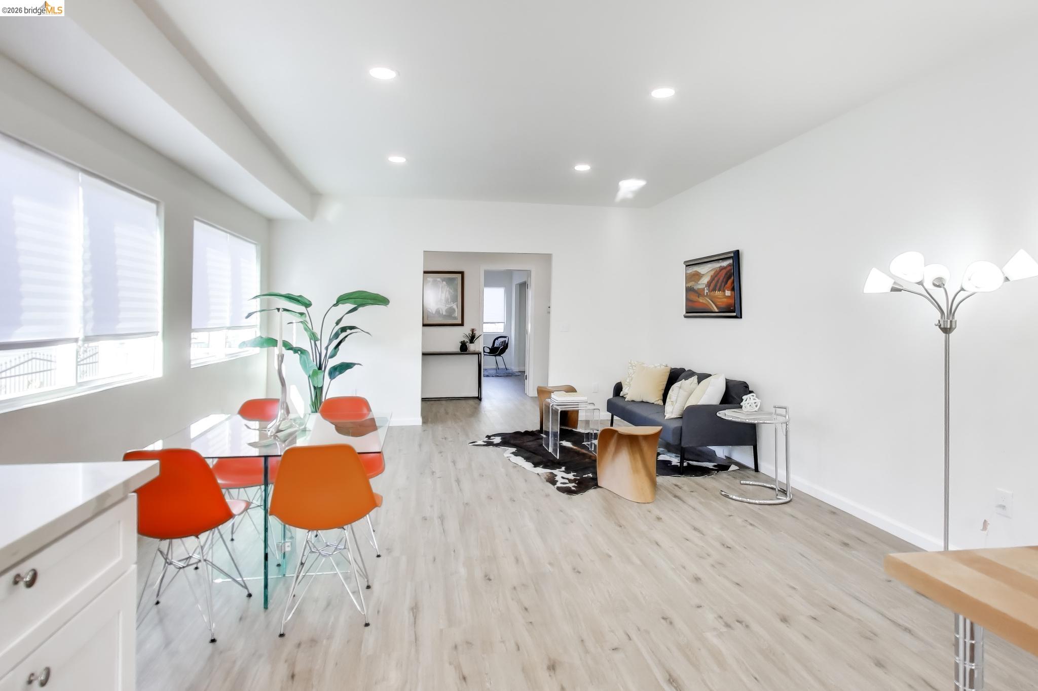 1978 Rosedale Avenue Oakland, CA 94601 - Photo 10 of 36 a living room with furniture kitchen view and a potted plant