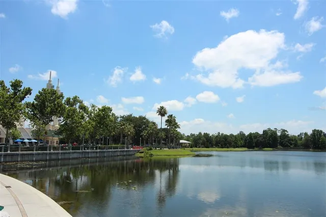 a view of a lake in middle of a house with lake view