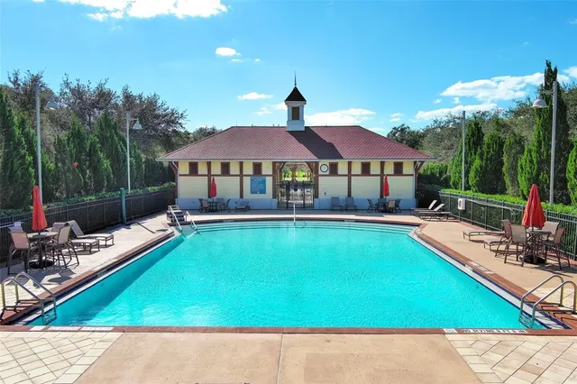 a view of a park with swings and slides