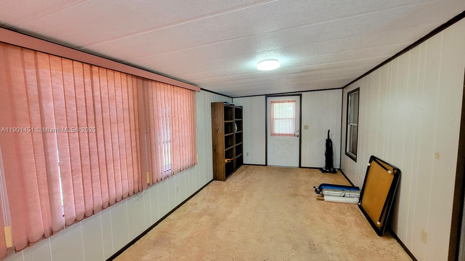 10 Hay Alva, FL 33920 - Photo 11 of 14 a view of a livingroom with furniture and a window