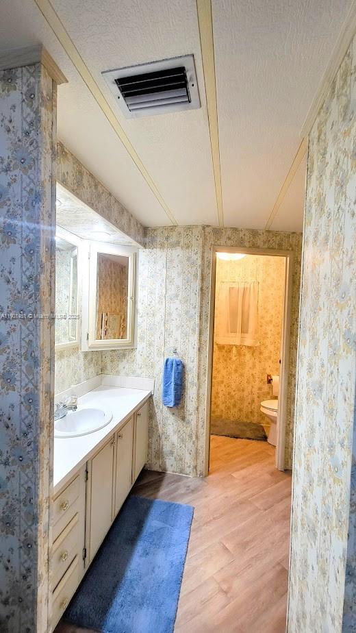 10 Hay Alva, FL 33920 - Photo 14 of 14 a bathroom with a sink and a large mirror