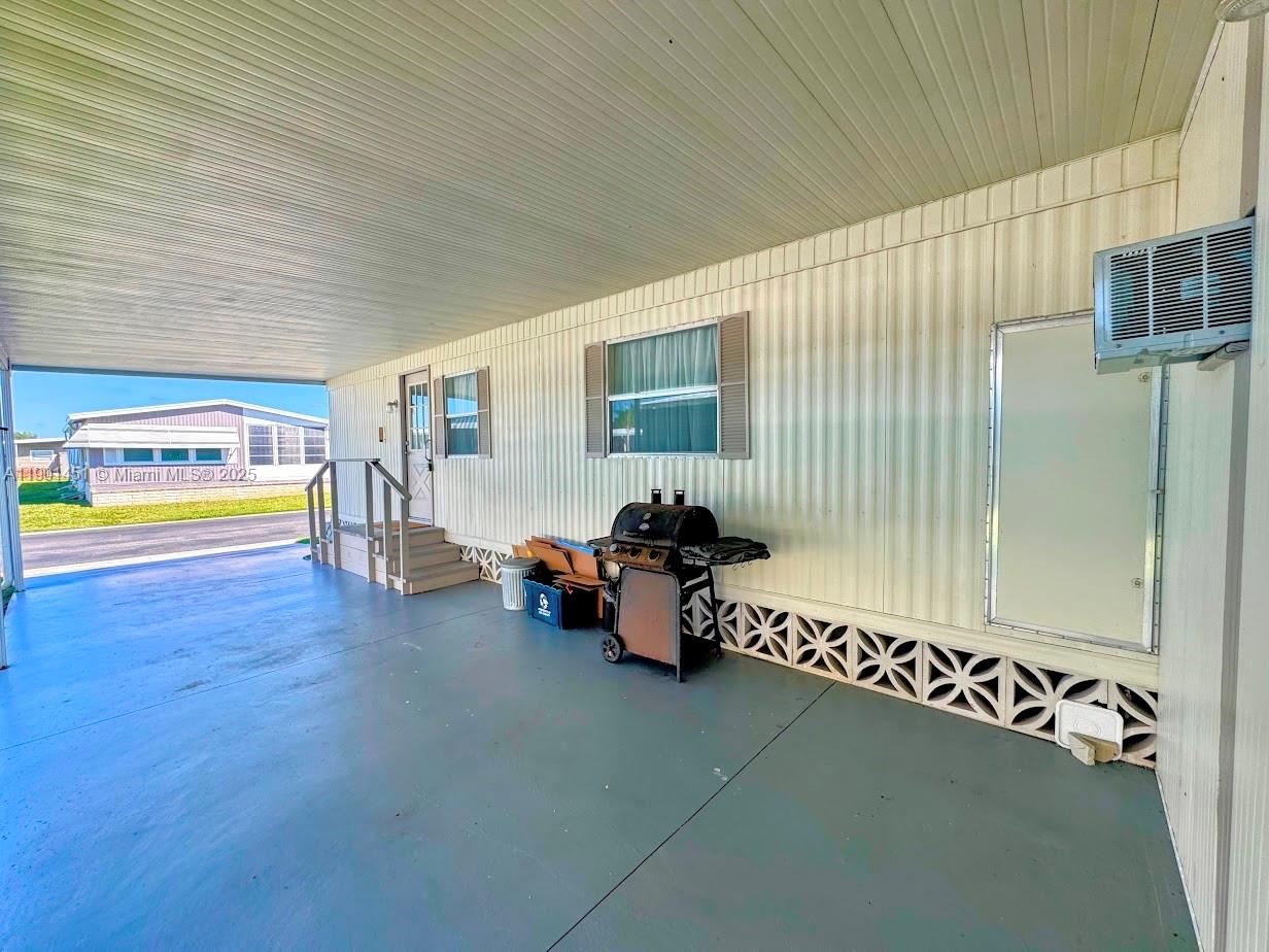 10 Hay Alva, FL 33920 - Photo 4 of 14 a room with furniture and a window