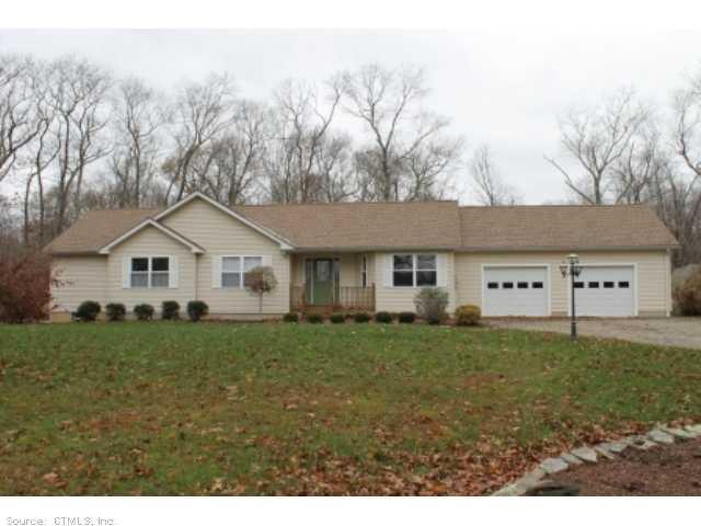 142 Whalehead Road Ledyard, CT 06335 - Photo 1 of 1 a view of a yard in front of a house with large trees