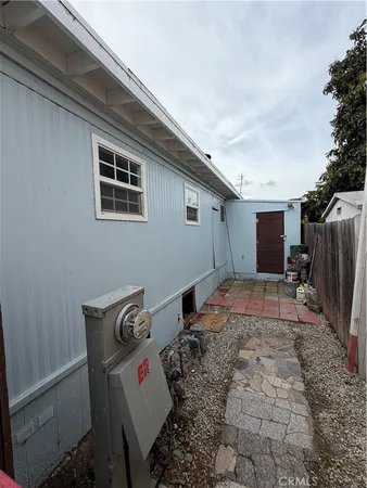 a backyard of a house with seating space